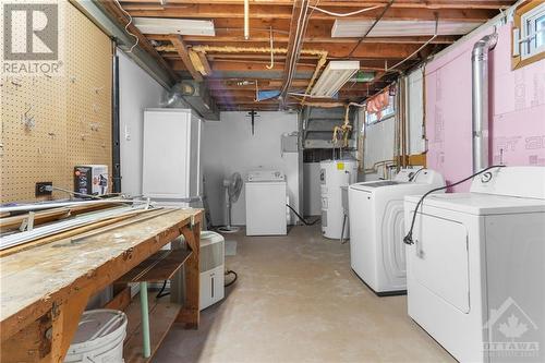 Convenient laundry unit for ease and efficiency right at home. - 1155 Minnetonka Road, Ottawa, ON - Indoor Photo Showing Laundry Room