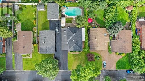 Stunning aerial view showcasing the expansive charm and lush surroundings of this mid-century bungalow. - 1155 Minnetonka Road, Ottawa, ON - Outdoor With View