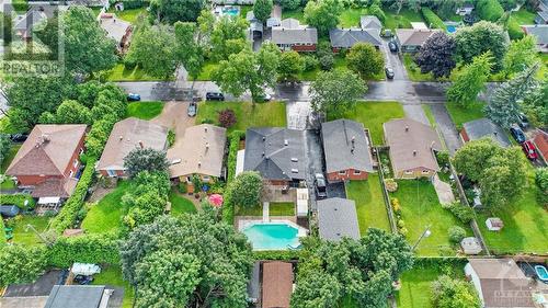 Stunning aerial view showcasing the expansive charm and lush surroundings of this mid-century bungalow. - 1155 Minnetonka Road, Ottawa, ON - Outdoor With In Ground Pool With View