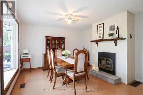 277 Crosby Drive, Kawartha Lakes (Bobcaygeon), ON - Indoor Photo Showing Dining Room With Fireplace