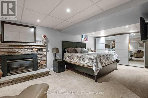 126 Adelaide Street N, Kawartha Lakes (Lindsay), ON - Indoor Photo Showing Bedroom With Fireplace