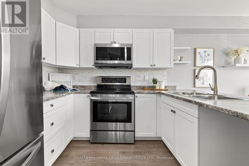 208 - 440 Lonsberry Drive, Cobourg, ON - Indoor Photo Showing Kitchen With Double Sink