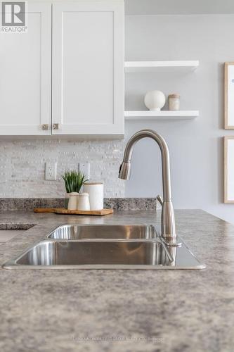 208 - 440 Lonsberry Drive, Cobourg, ON - Indoor Photo Showing Kitchen With Double Sink