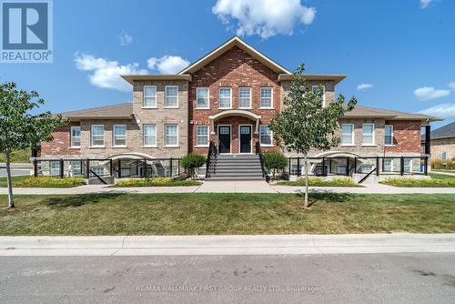 208 - 440 Lonsberry Drive, Cobourg, ON - Outdoor With Facade