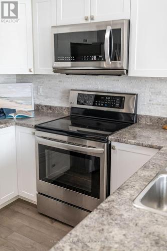 208 - 440 Lonsberry Drive, Cobourg, ON - Indoor Photo Showing Kitchen