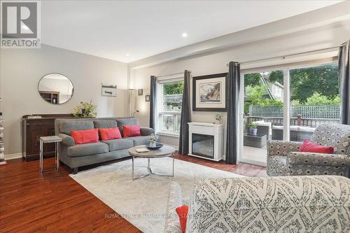 16 - 218 Plains Road E, Burlington (Lasalle), ON - Indoor Photo Showing Living Room With Fireplace