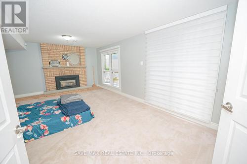 58 Blackthorn Lane, Brampton (Brampton North), ON - Indoor Photo Showing Other Room With Fireplace