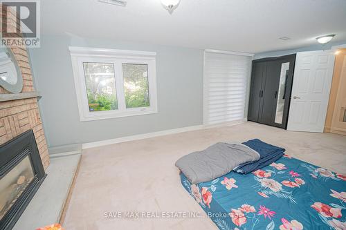 58 Blackthorn Lane, Brampton (Brampton North), ON - Indoor Photo Showing Bedroom With Fireplace