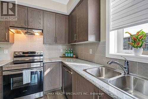 406 - 70 Halliford Place, Brampton (Bram East), ON - Indoor Photo Showing Kitchen With Double Sink