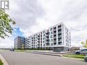 108 - 1440 Clarriage Court, Milton (Ford), ON  - Outdoor With Facade 