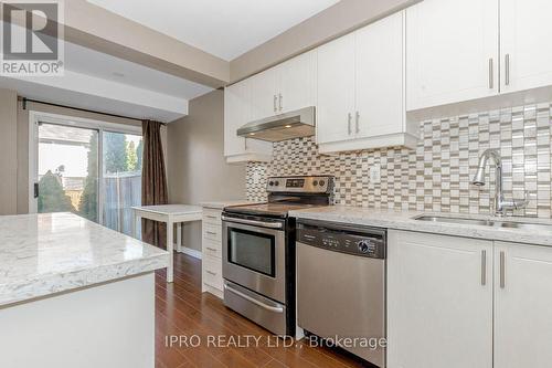 92 - 5910 Greensboro Drive, Mississauga (Central Erin Mills), ON - Indoor Photo Showing Kitchen With Stainless Steel Kitchen With Double Sink With Upgraded Kitchen