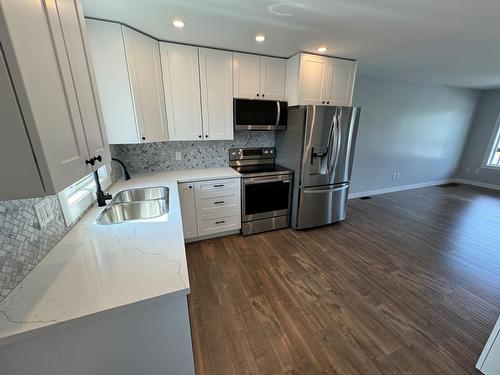 A - 2680 75Th Avenue, Grand Forks, BC - Indoor Photo Showing Kitchen With Stainless Steel Kitchen With Double Sink