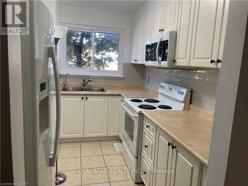 38 - 201 Silvercreek Parkway N, Guelph, ON - Indoor Photo Showing Kitchen With Double Sink