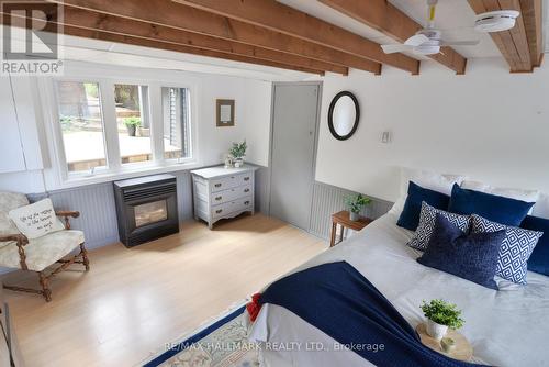 10 Kellington Point Road, Parry Sound, ON - Indoor Photo Showing Bedroom With Fireplace