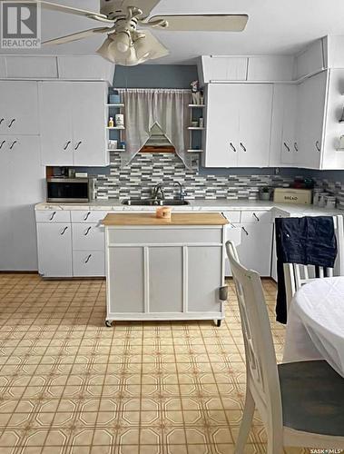 50 2 Avenue E, Montmartre, SK - Indoor Photo Showing Kitchen With Double Sink