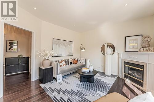 64 Lakespring Drive, Markham (Cachet), ON - Indoor Photo Showing Living Room With Fireplace