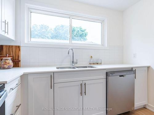 80 Woodman Dr N, Hamilton, ON - Indoor Photo Showing Kitchen With Double Sink