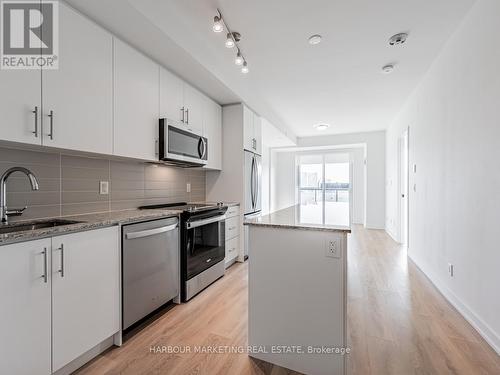 512 - 345 Wheat Boom Drive, Oakville, ON - Indoor Photo Showing Kitchen With Upgraded Kitchen