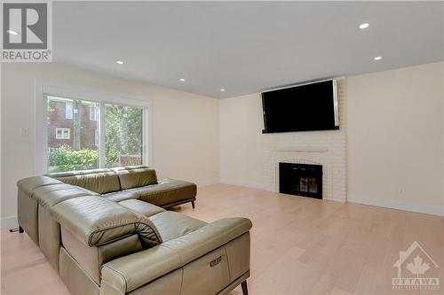 21 Parmalea Crescent, Ottawa, ON - Indoor Photo Showing Living Room With Fireplace