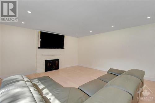 21 Parmalea Crescent, Ottawa, ON - Indoor Photo Showing Living Room With Fireplace