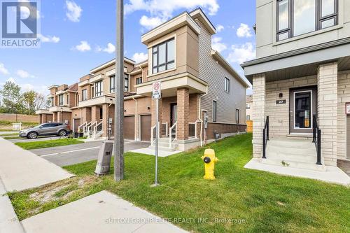 65 - 31 Caspian Square, Clarington, ON - Outdoor With Facade