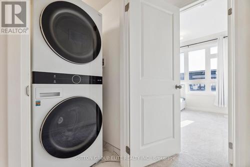 65 - 31 Caspian Square, Clarington (Bowmanville), ON - Indoor Photo Showing Laundry Room