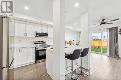 65 - 31 Caspian Square, Clarington, ON - Indoor Photo Showing Kitchen With Stainless Steel Kitchen