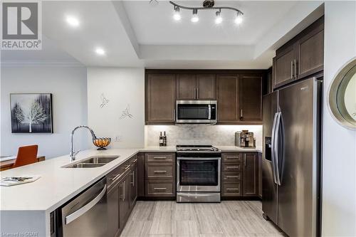 1878 Gordon Street Unit# 307, Guelph, ON - Indoor Photo Showing Kitchen With Stainless Steel Kitchen With Double Sink With Upgraded Kitchen