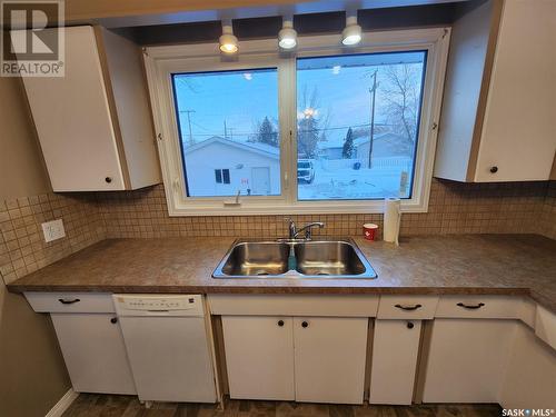 205 1St Avenue Nw, Weyburn, SK - Indoor Photo Showing Kitchen With Double Sink