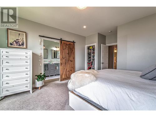 6670 Blackcomb Way, Vernon, BC - Indoor Photo Showing Bedroom