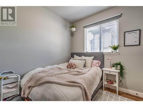 6670 Blackcomb Way, Vernon, BC - Indoor Photo Showing Bedroom