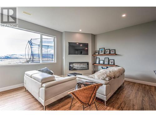 6670 Blackcomb Way, Vernon, BC - Indoor Photo Showing Living Room With Fireplace