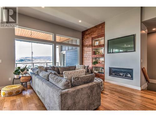 6670 Blackcomb Way, Vernon, BC - Indoor Photo Showing Living Room With Fireplace