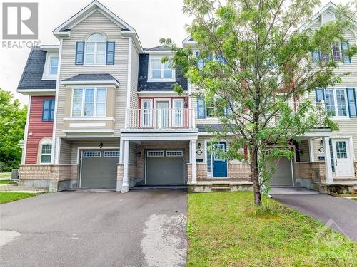 558 Foxlight Circle, Ottawa, ON - Outdoor With Balcony With Facade