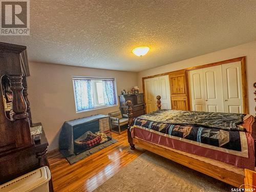 1 Park Boulevard, Melville, SK - Indoor Photo Showing Bedroom With Fireplace