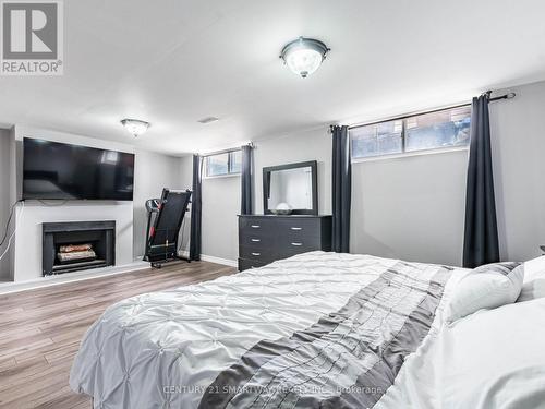 7182 Harwick Drive, Mississauga, ON - Indoor Photo Showing Bedroom With Fireplace