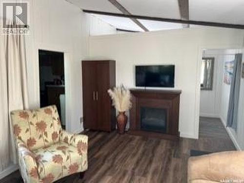 510 Osborne Lane, Regina Beach, SK - Indoor Photo Showing Living Room With Fireplace