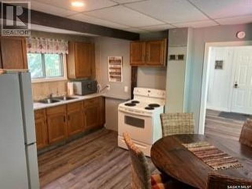 510 Osborne Lane, Regina Beach, SK - Indoor Photo Showing Kitchen With Double Sink