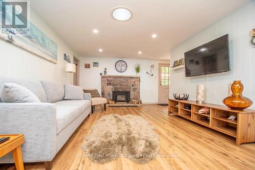 26 Manitou Lane, Kawartha Lakes (Bobcaygeon), ON - Indoor Photo Showing Living Room With Fireplace