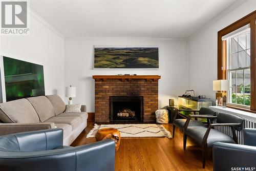 115 Leopold Crescent, Regina, SK - Indoor Photo Showing Living Room With Fireplace