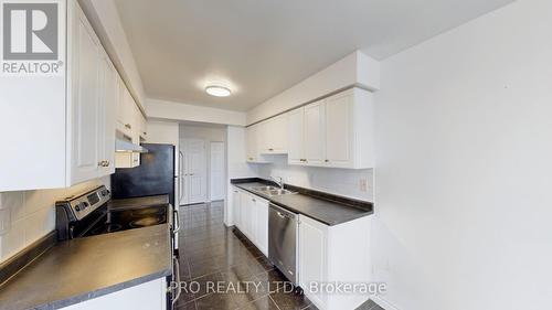 812 - 35 Kingsbridge Gardens, Mississauga (Hurontario), ON - Indoor Photo Showing Kitchen With Double Sink