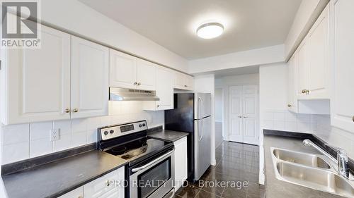 812 - 35 Kingsbridge Gardens, Mississauga (Hurontario), ON - Indoor Photo Showing Kitchen With Stainless Steel Kitchen With Double Sink