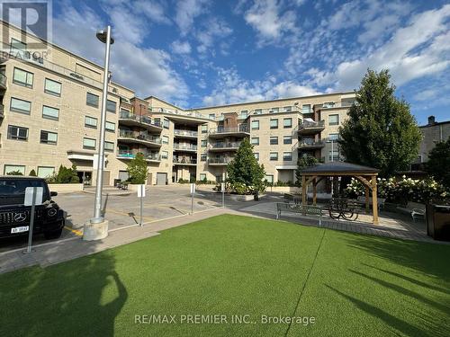 313 - 86 Woodbridge Avenue S, Vaughan, ON - Outdoor With Balcony With Facade