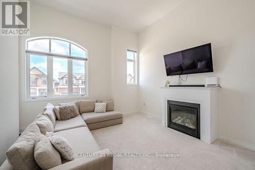 30 Rustic Oak Trail, North Dumfries, ON - Indoor Photo Showing Living Room With Fireplace