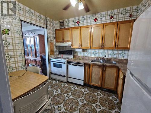 601 - 3390 Weston Road, Toronto (Humbermede), ON - Indoor Photo Showing Kitchen With Double Sink