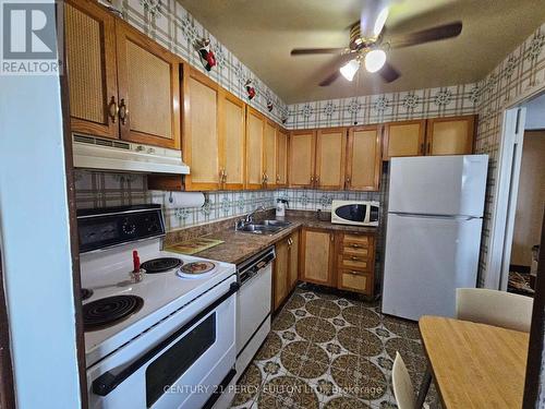 601 - 3390 Weston Road, Toronto (Humbermede), ON - Indoor Photo Showing Kitchen With Double Sink