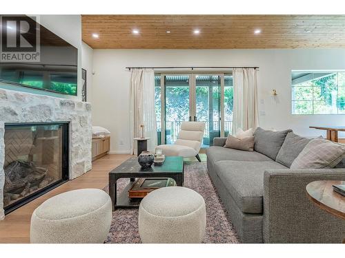 9961/9963 Purcell Drive, Vernon, BC - Indoor Photo Showing Living Room With Fireplace