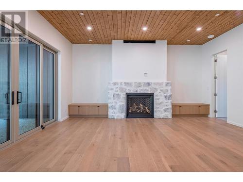 9963 Purcell Drive, Vernon, BC - Indoor Photo Showing Living Room With Fireplace