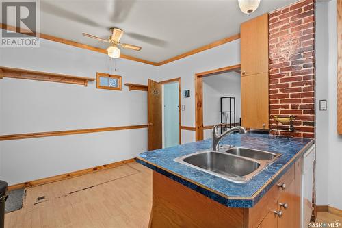 546 7Th Street E, Prince Albert, SK - Indoor Photo Showing Kitchen With Double Sink