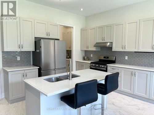 12 Carlinds Crescent, Whitchurch-Stouffville (Ballantrae), ON - Indoor Photo Showing Kitchen With Double Sink With Upgraded Kitchen